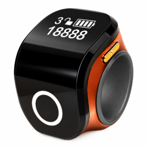 The image shows a Portable Ring Japa Counter with Android connectivity and touch display, featuring an adjustable ring design for comfortable use. This digital Naam Japa Counter helps track chanting data through a connected app and is suitable for Naam Jap, Jaap, meditation, prayer and mantra chanting.