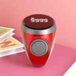 The image shows a Portable Ring Naam Japa Tally Counter with a 1 lakh counting capacity, designed for easy Naam Jap, chanting, meditation and prayer. Its compact ring design makes it convenient to carry and use as a Japa Counter, Jaap Counter, Chanting Counter, Mala Counter and Mantra Counter.