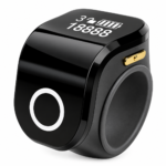 The image shows a Portable Ring Japa Counter with Android connectivity and touch display, featuring an adjustable ring design for comfortable use. This digital Naam Japa Counter helps track chanting data through a connected app and is suitable for Naam Jap, Jaap, meditation, prayer and mantra chanting.