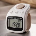 The image shows a 60 Lakh Naam Japa Counter with a noiseless button, LED light, and date and time display. This digital Japa Counter is designed for Naam Jap, chanting, meditation, prayer and mantra practice. It can also be used as a Jaap Counter, Chanting Counter, Mala Counter and Mantra Counter for keeping track of daily chants.